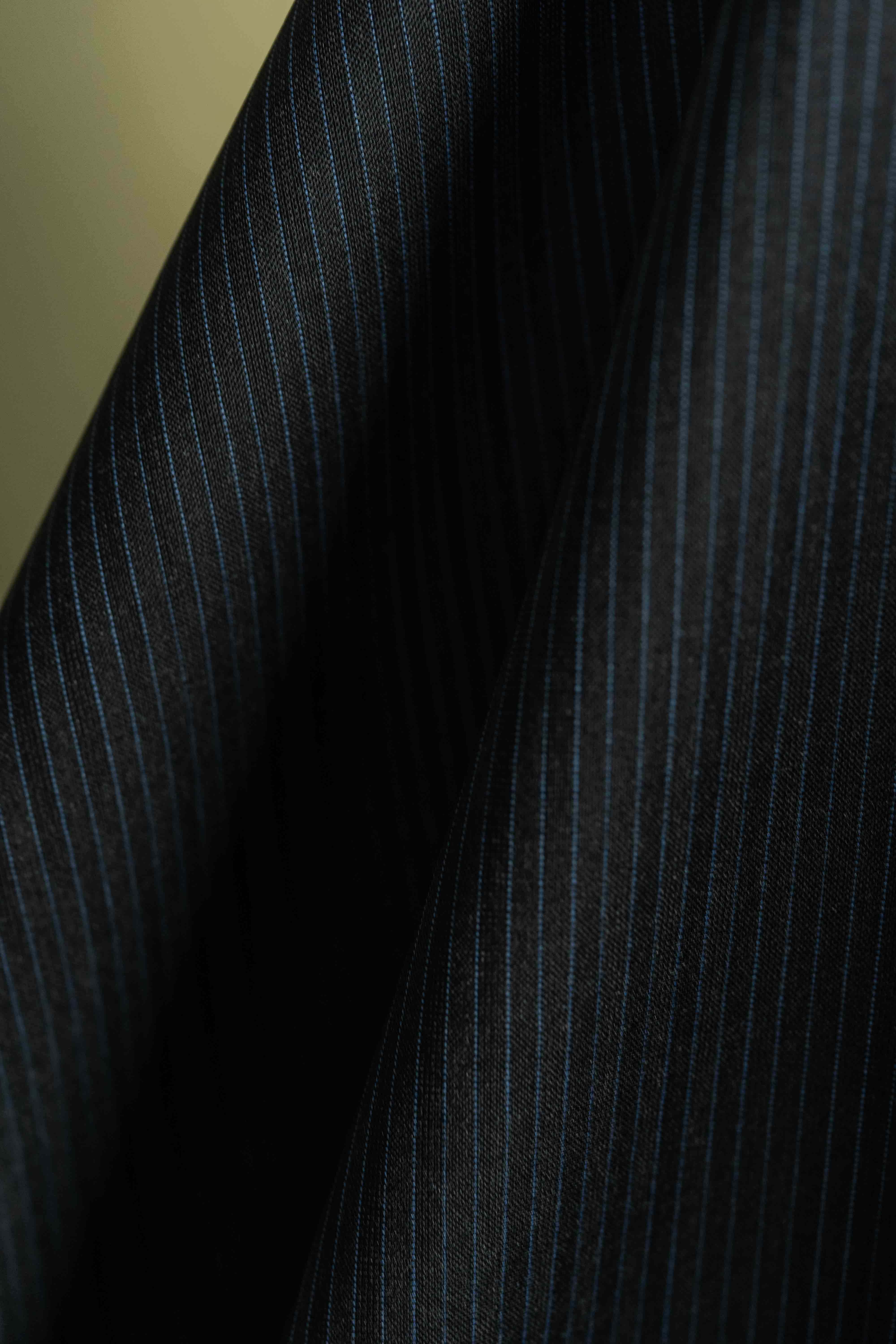 Lassiere Charcoal Blue Stripe 130's Suit fabric (V23310) showcasing the elegant pattern of suit fabric.