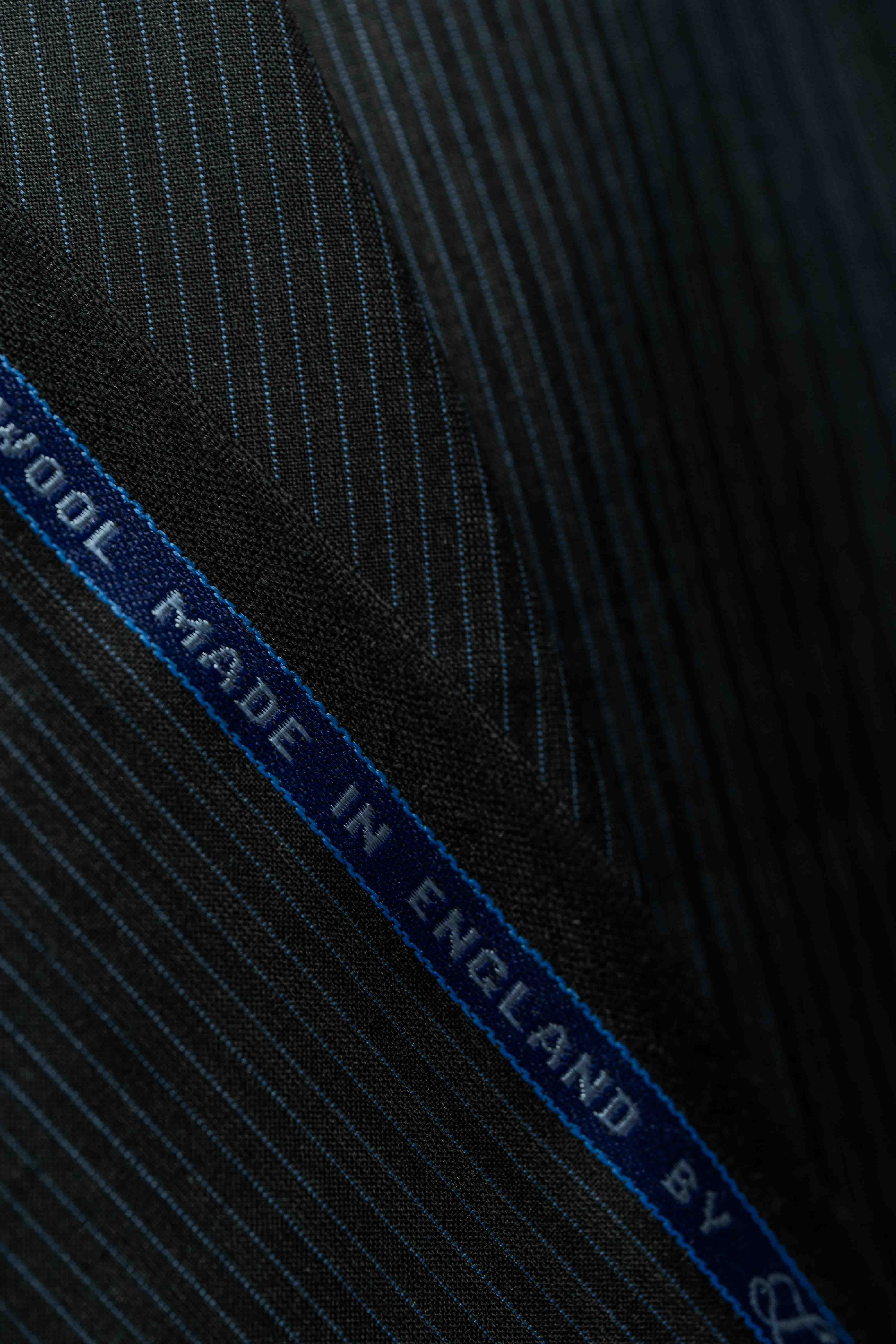 Lassiere Charcoal Blue Stripe 130's Suit fabric (V23310) showing fine detailing in suit fabric texture.