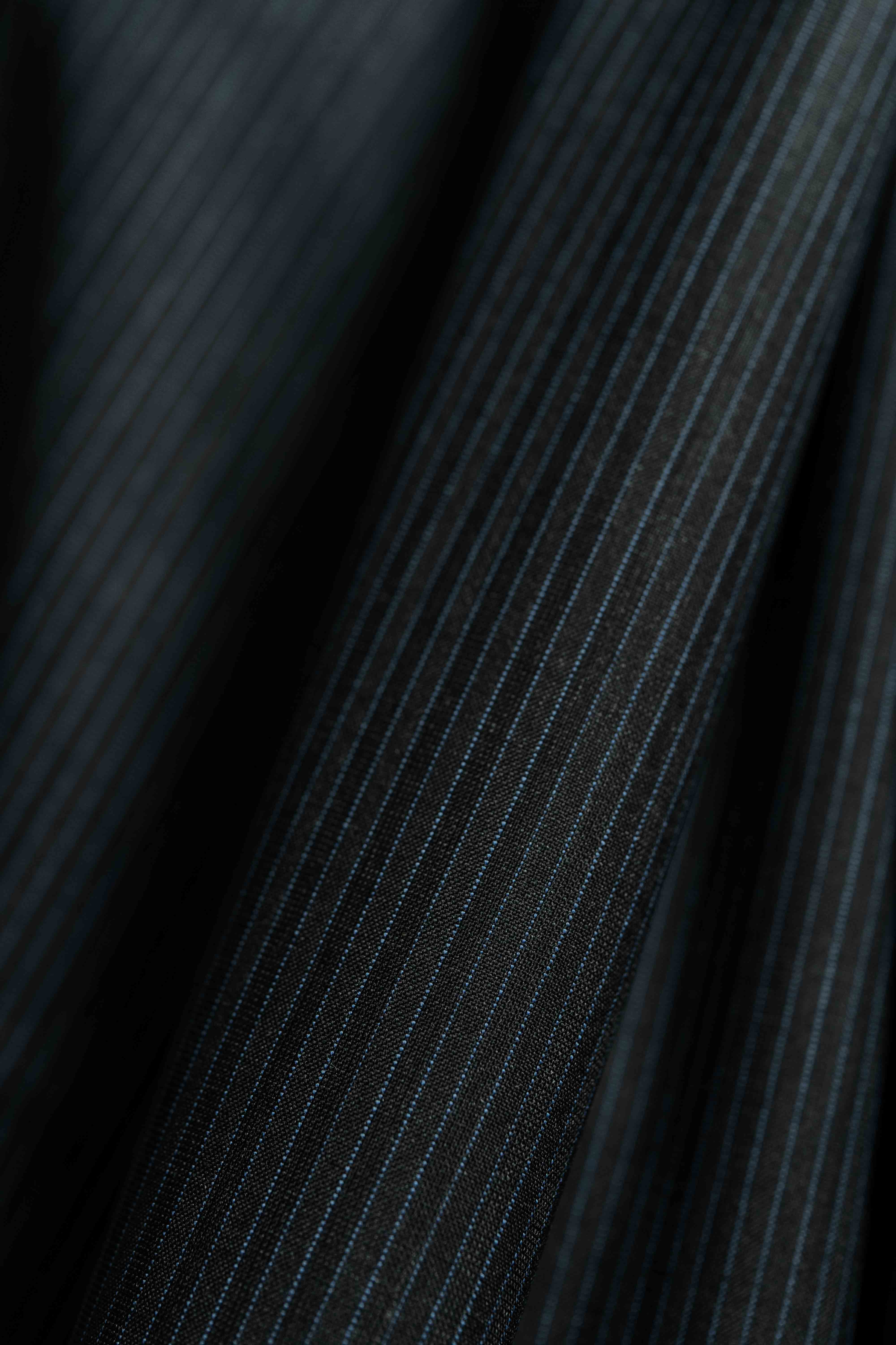 Lassiere Charcoal Blue Stripe 130's Suit fabric V23310 close-up, showcasing high-quality suit fabric with elegant stripes.