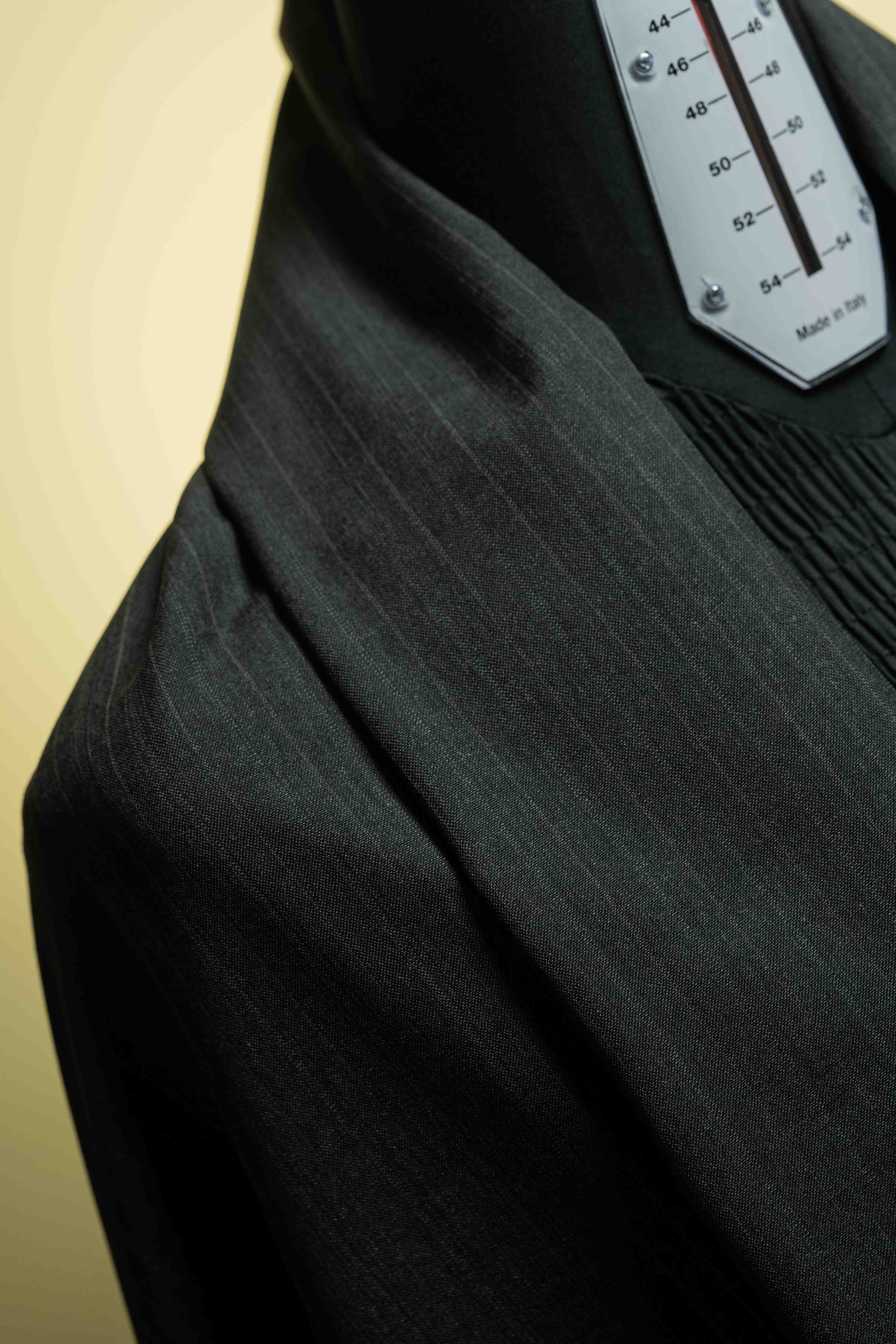 Lassitex Charcoal Stripe Merino Wool Suit Fabric (V23385) showcasing elegant texture for ideal suit fabric.