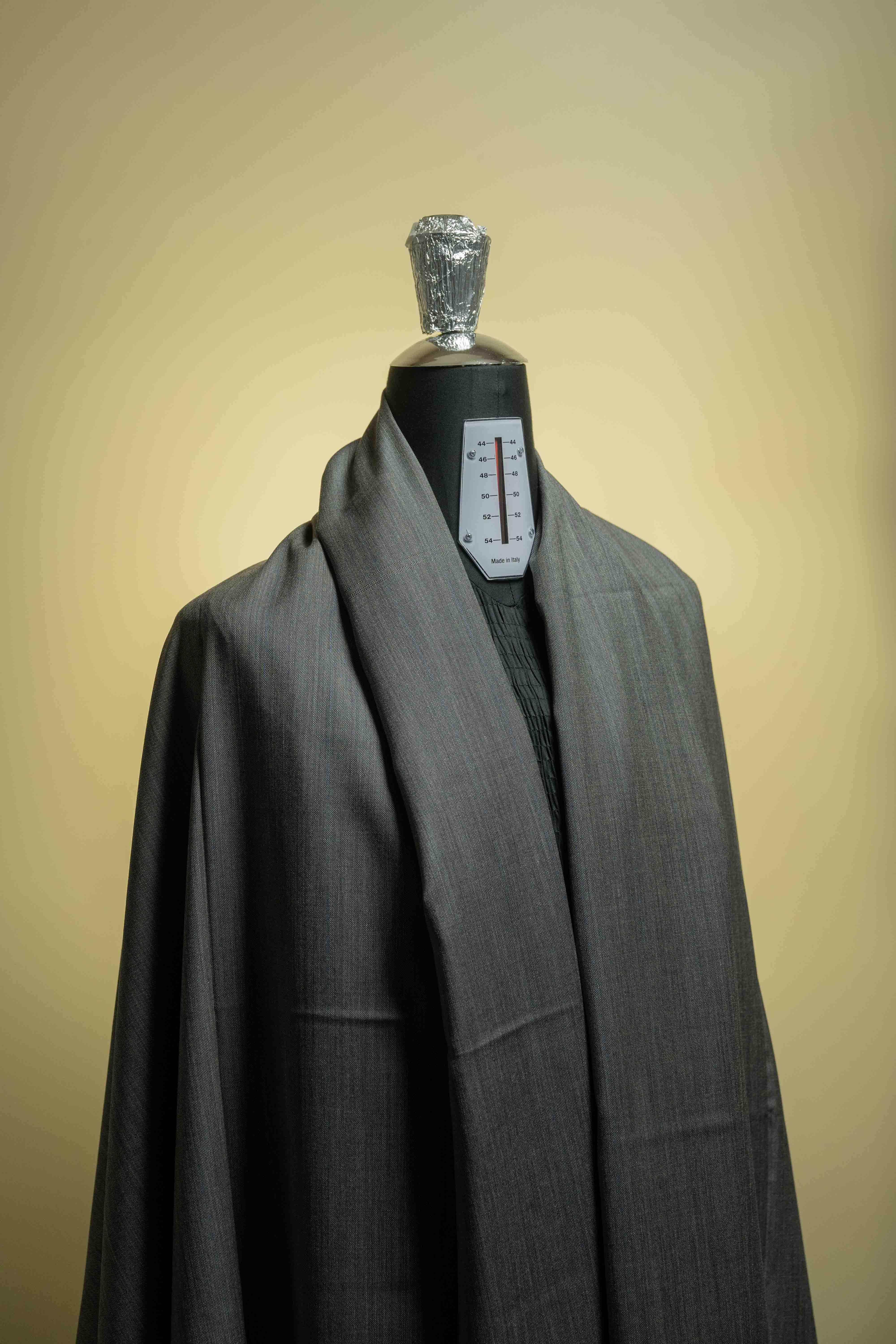 Scabal Grey Blue Stripe 100's Merino Suit Fabric showcased on a mannequin for tailored fashion.