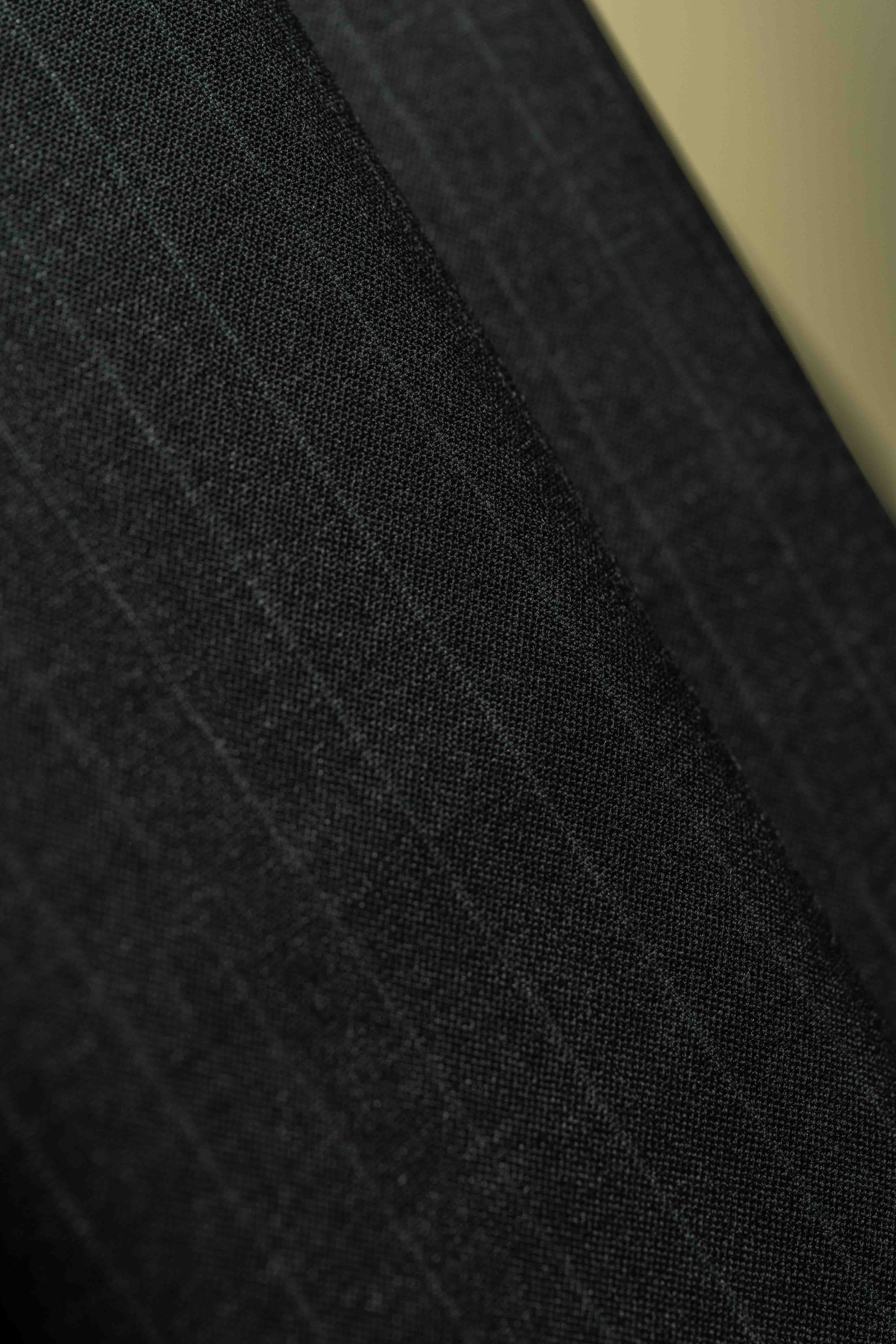 High Twist Dark Grey 120's Wool Cashmere suit fabric close-up texture.