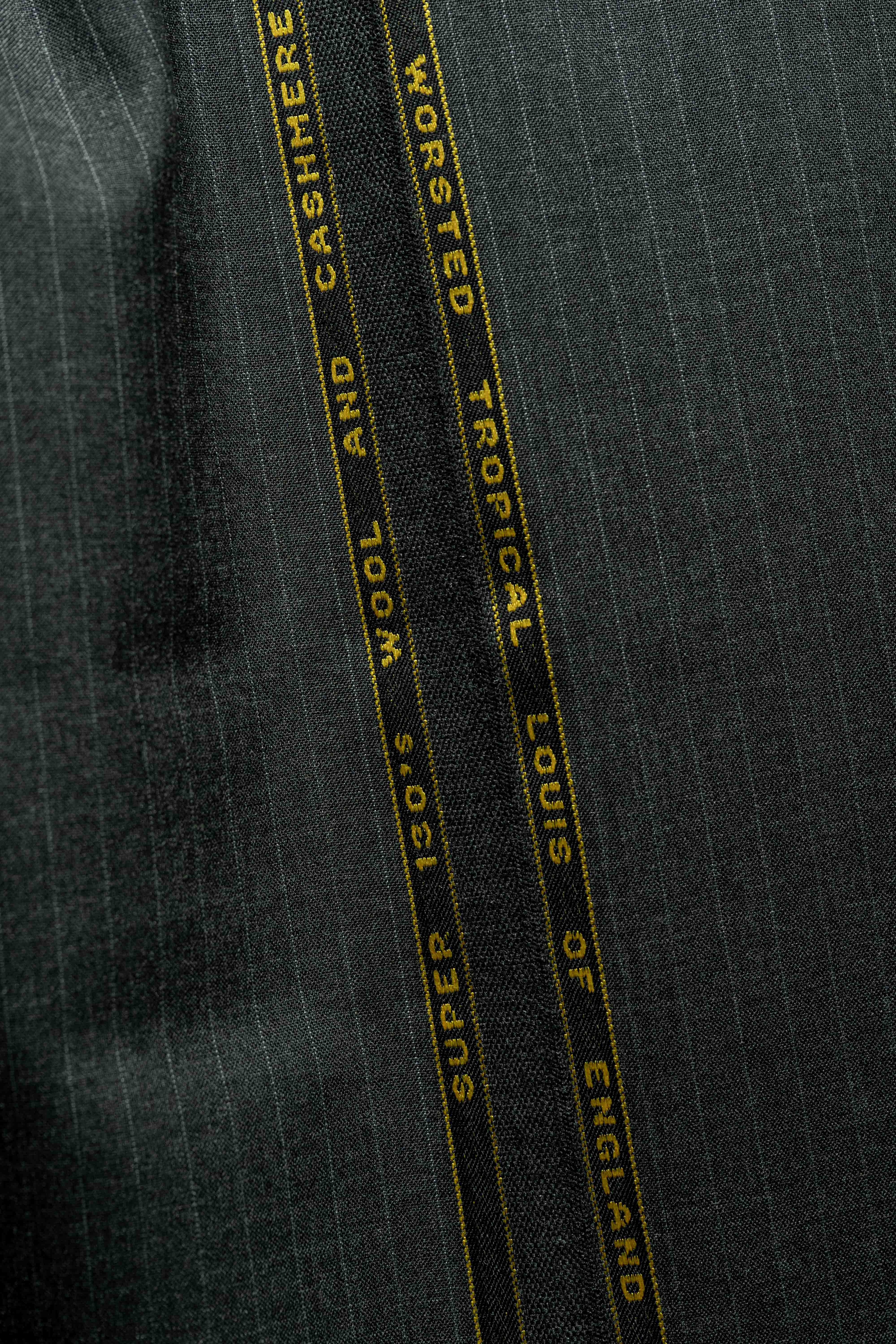 Mid grey pinstripe wool cashmere suit fabric featuring Super 130's Wool and Cashmere label for premium quality.