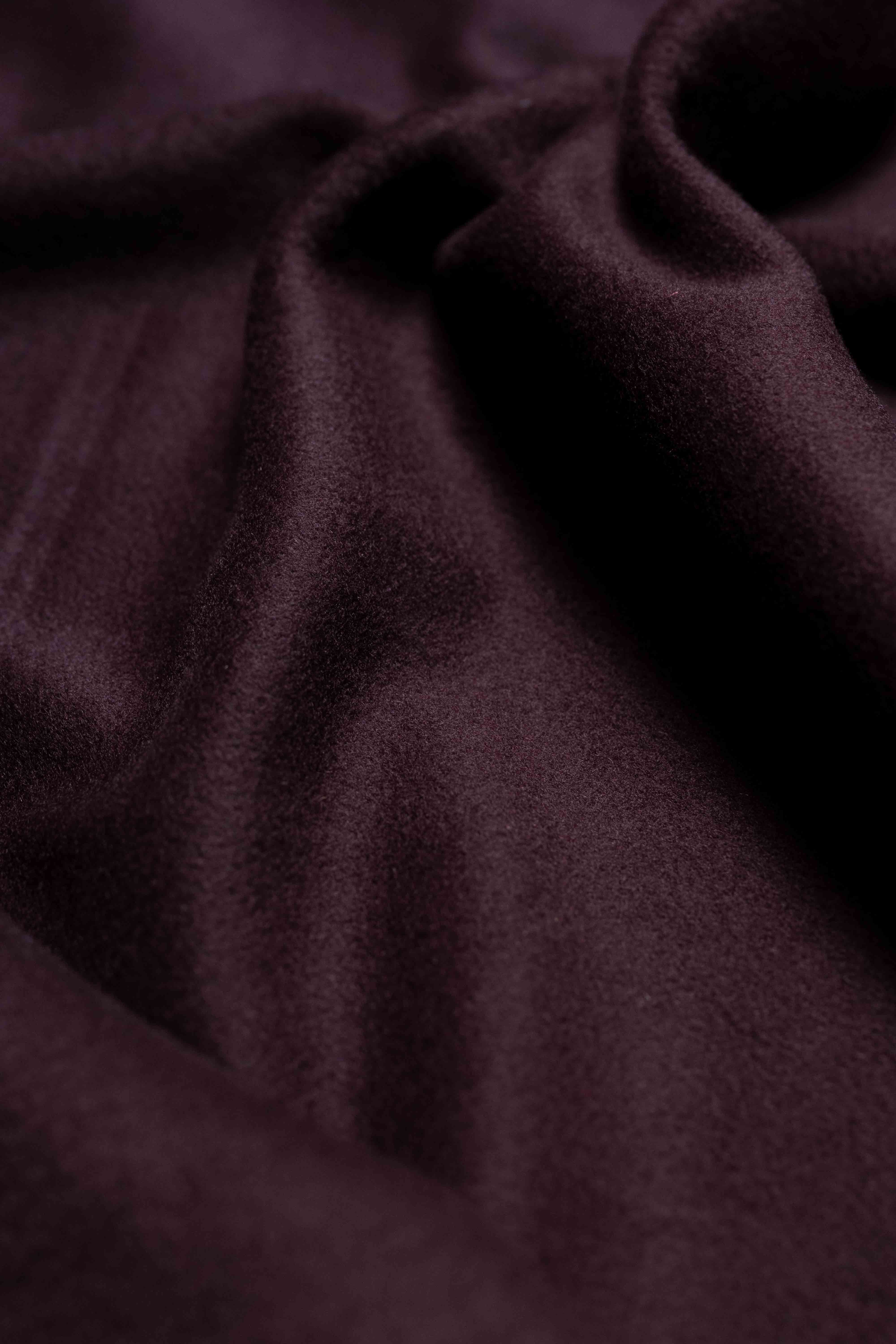 Close-up of dark purple fabric texture