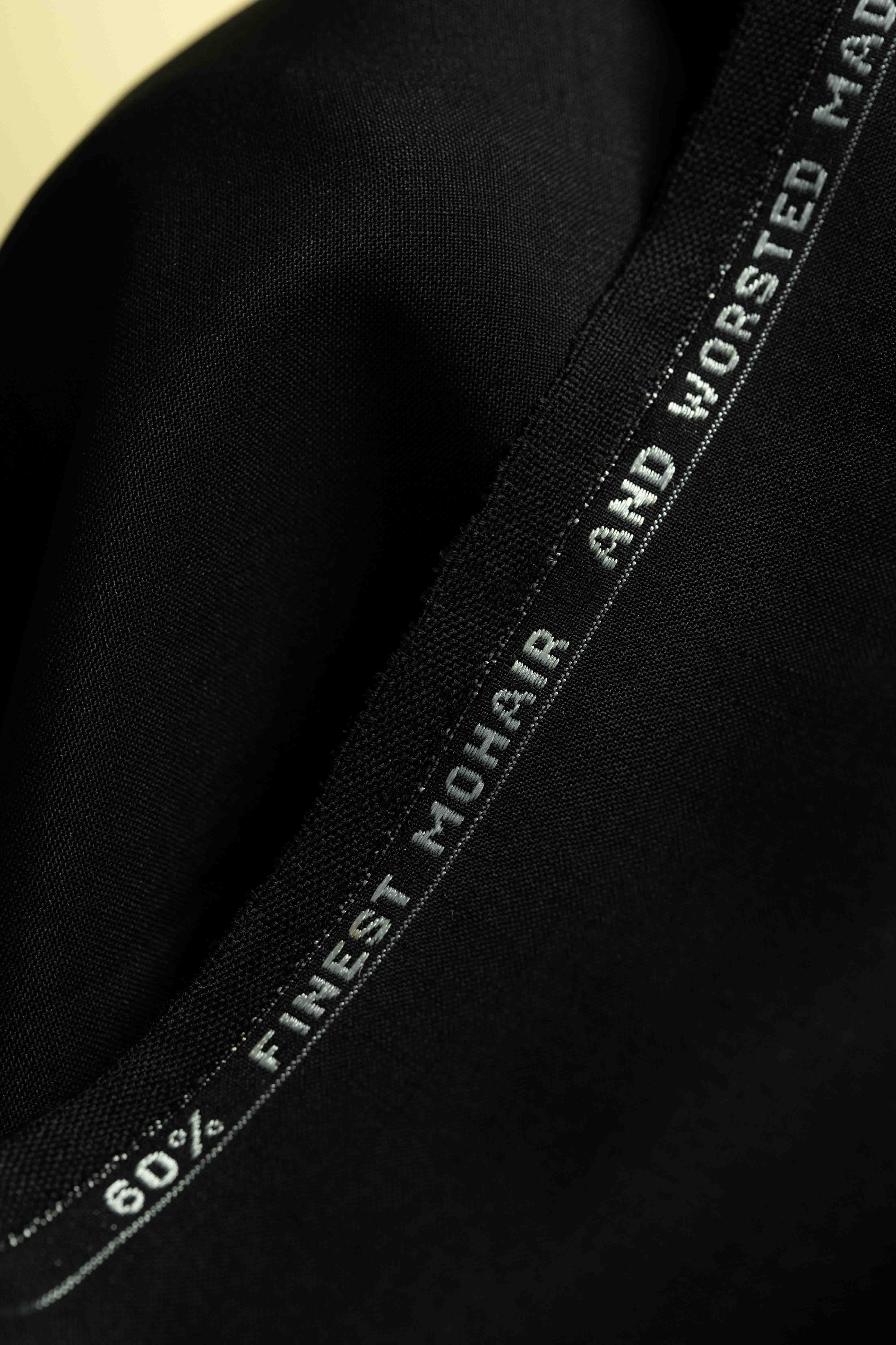 Suit fabric in black wool mohair for trousers with 60% finest mohair detail.