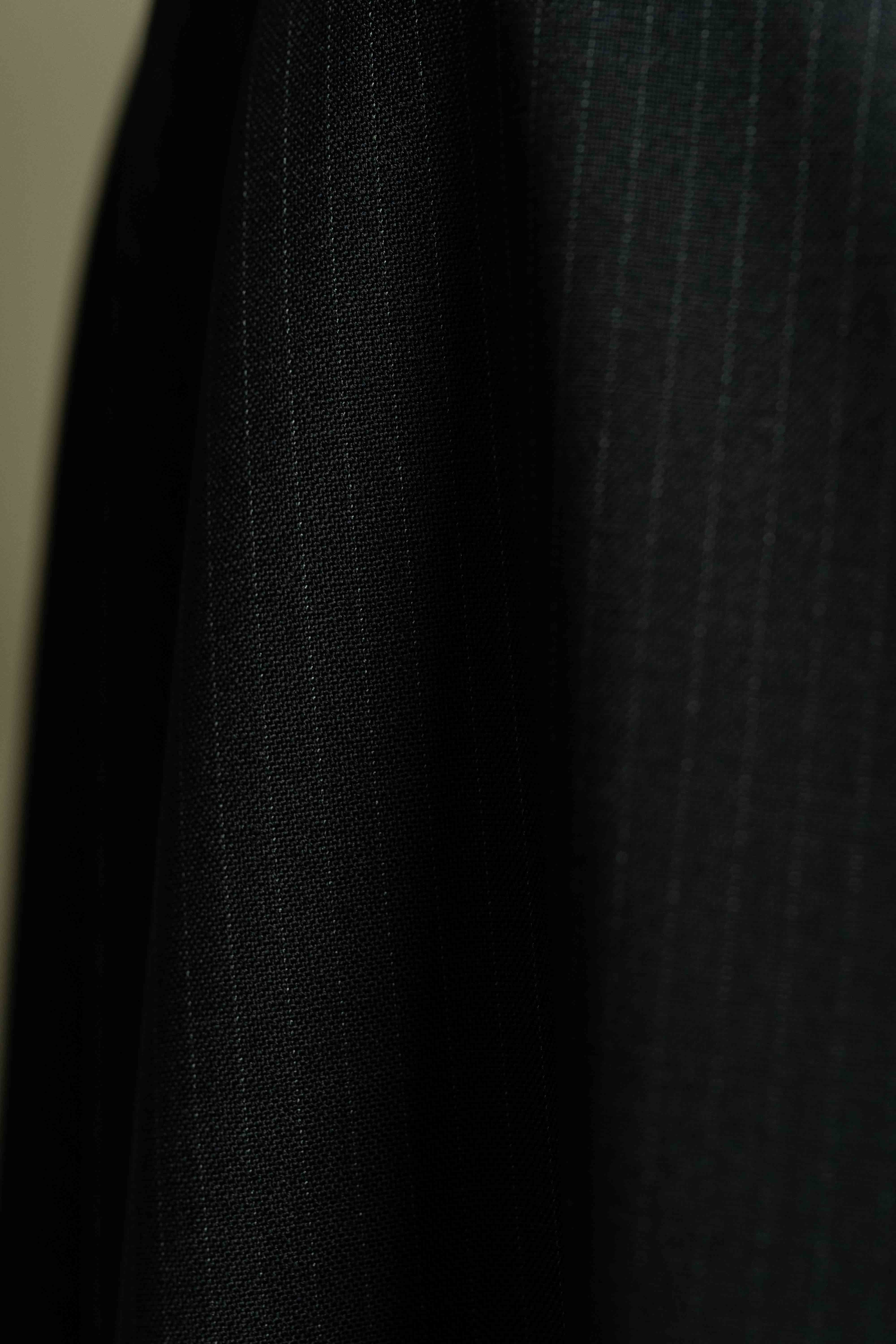 Reda Black Stripe Merino Wool Suit Fabric (V23334) close-up showing fine texture and pattern.