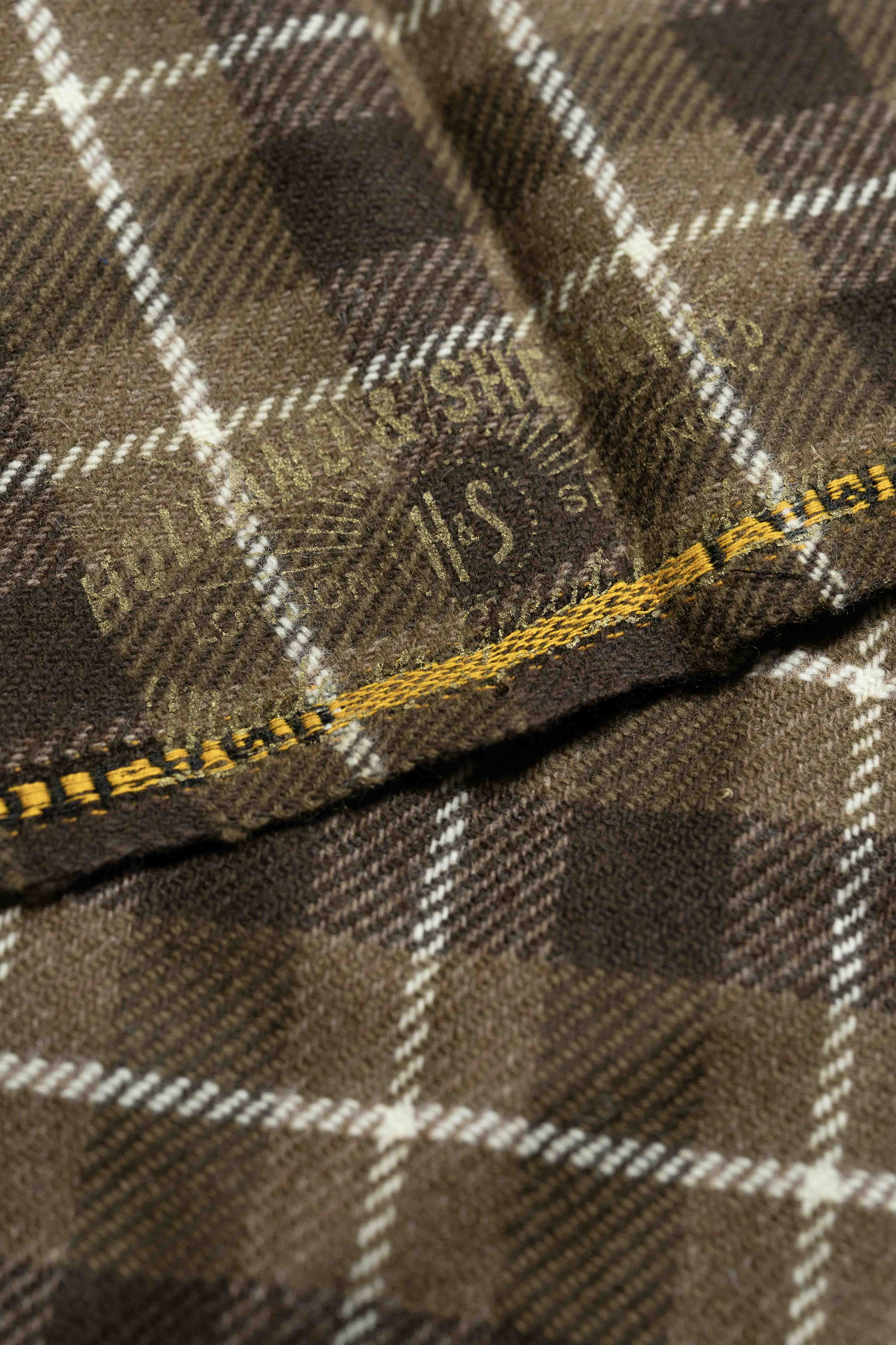 Lambswool Suit Fabric in Brown Check (SA-1112) showcasing detailed plaid texture and stitching.