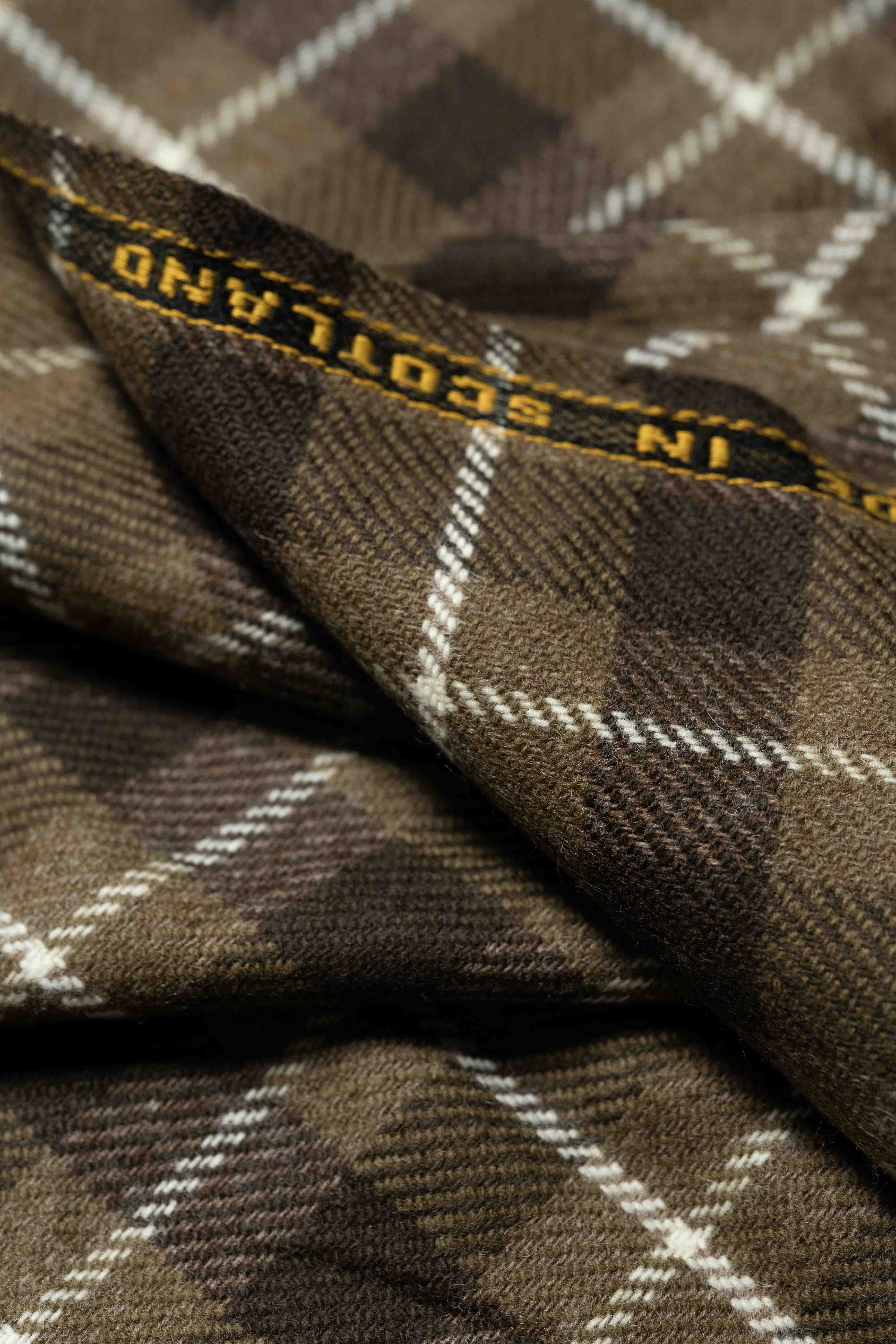 Lambswool Suit Fabric in Brown Check (SA-1112) showcasing a close-up of the intricate pattern and texture.