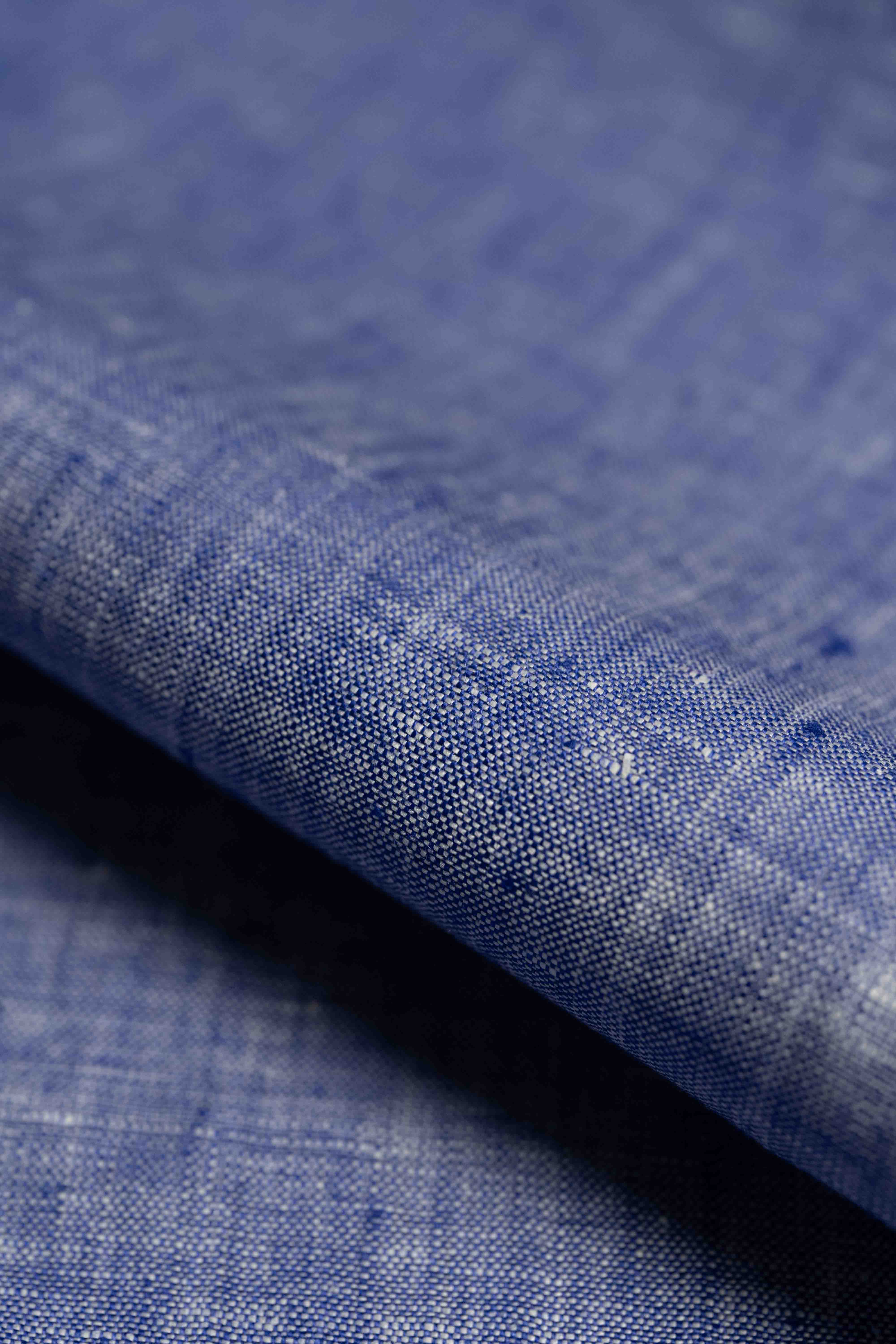 Close-up of blue fabric with a textured pattern
