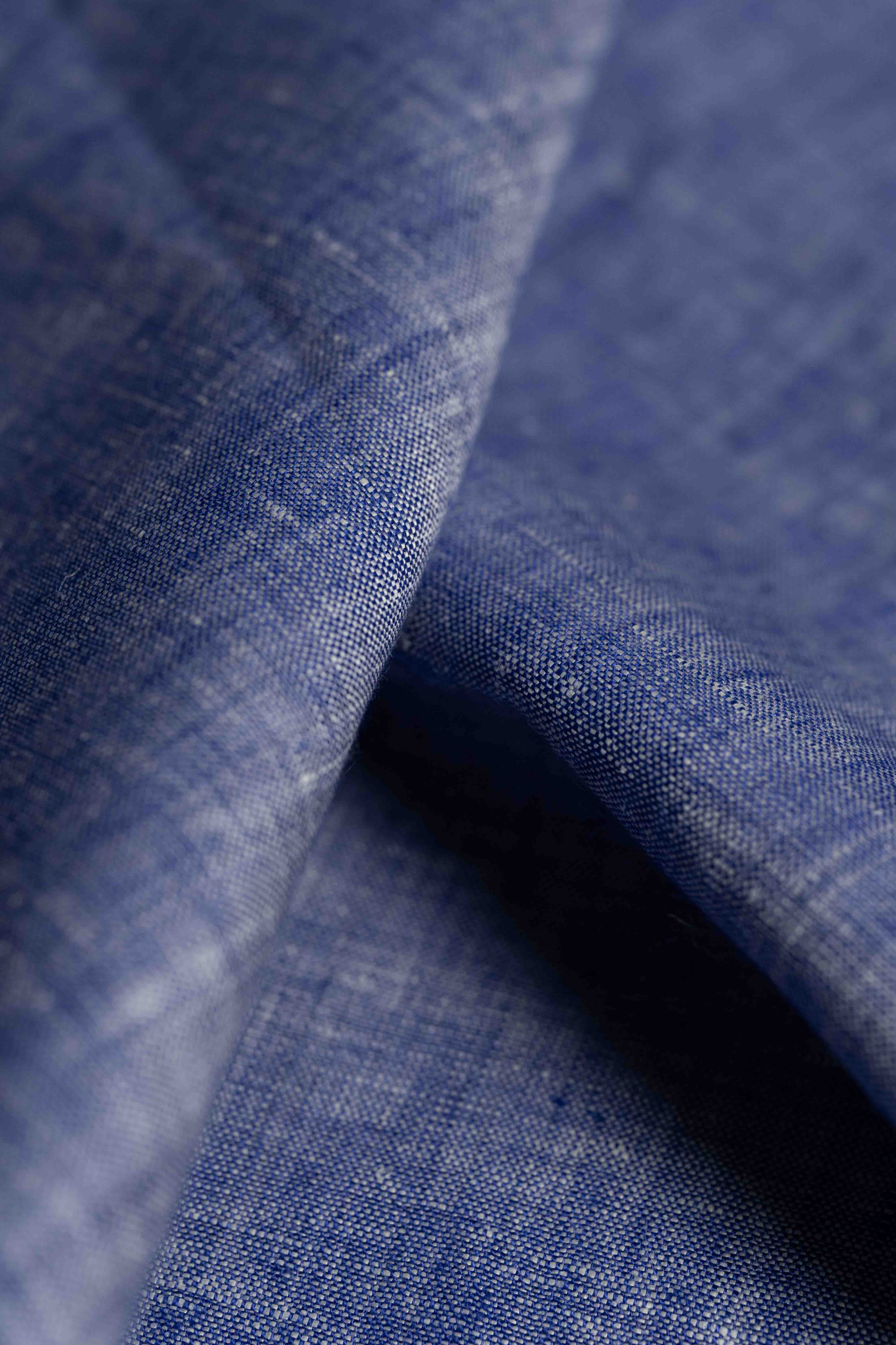 Close-up of blue fabric with a textured pattern