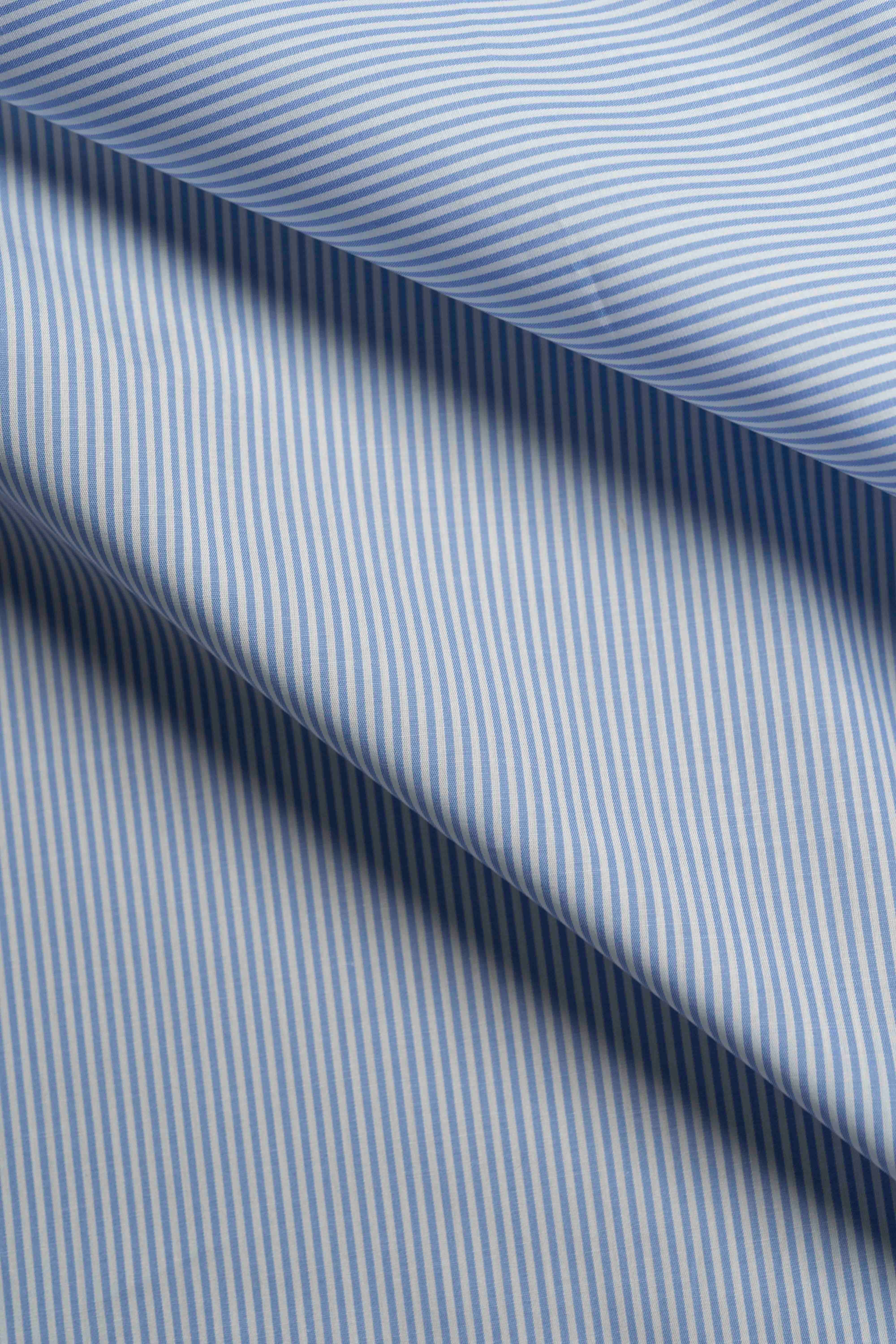 Close-up of Alumo blue and white striped fabric