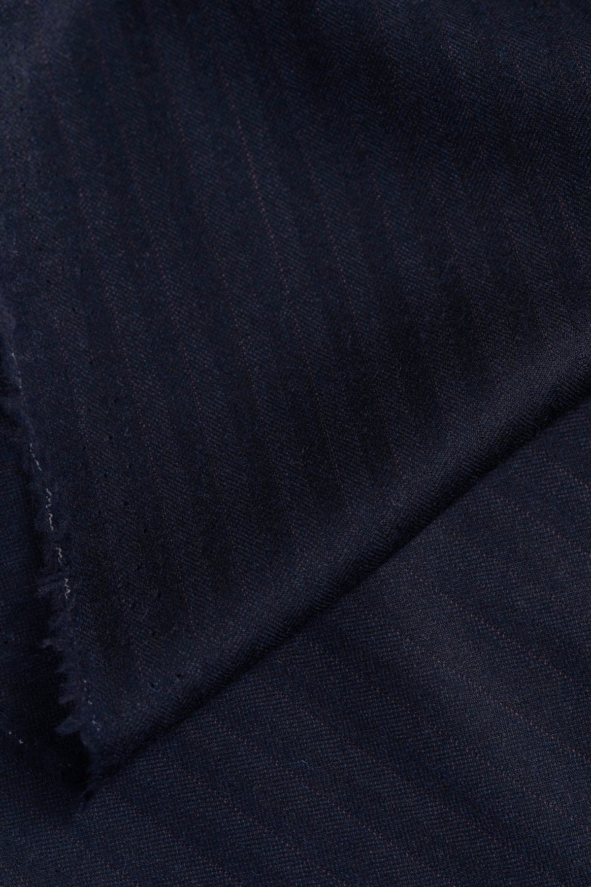 Lightweight Wool Flannel Suiting in Navy Herringbone