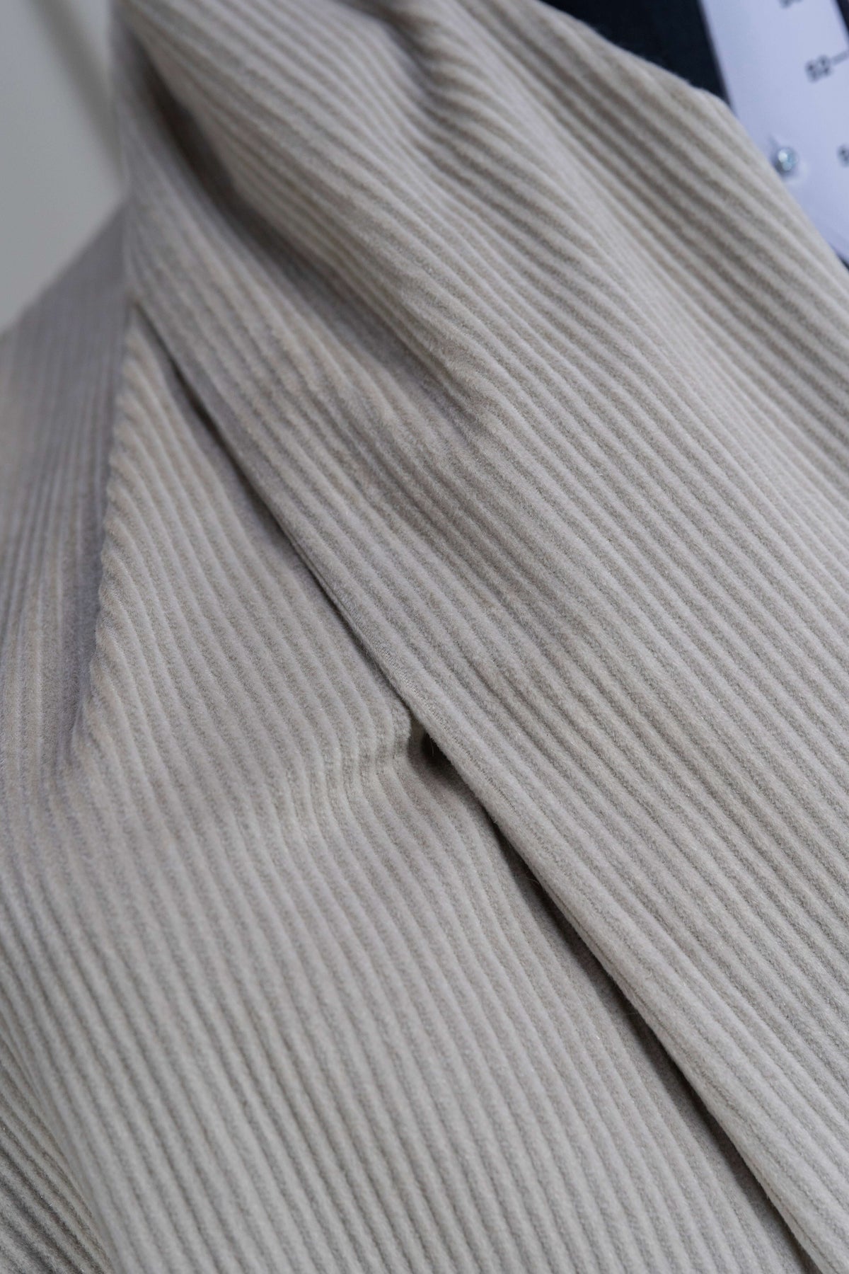 Close-up of PONTOGLIO 1883 cotton cashmere corduroy suiting fabric showcasing its soft texture and fine ribbing.